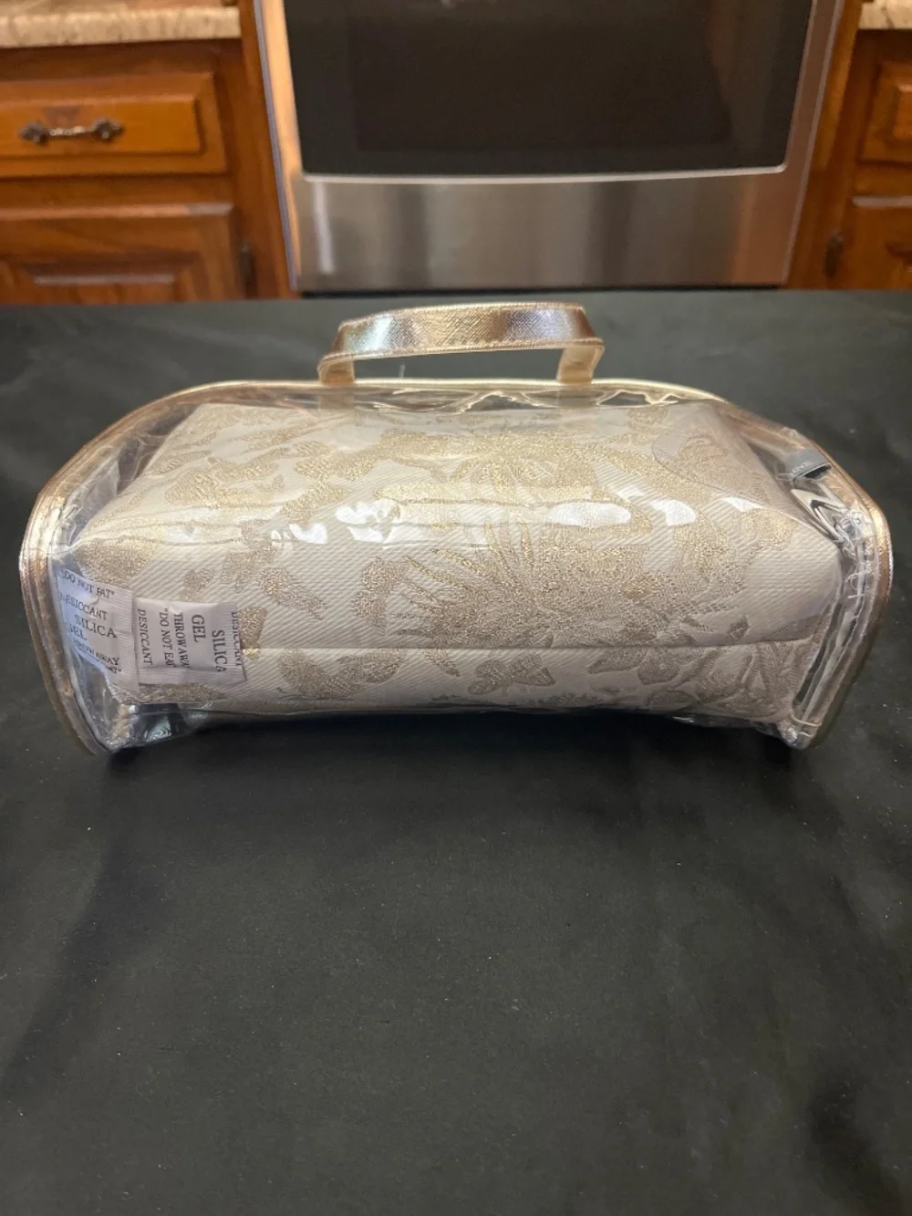NWT Vince Camuto Clear PVC/Floral/Gold 3 Piece Make /Up bag Set.